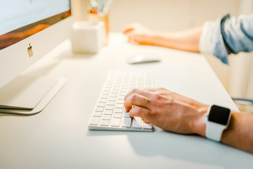 writing email at desk