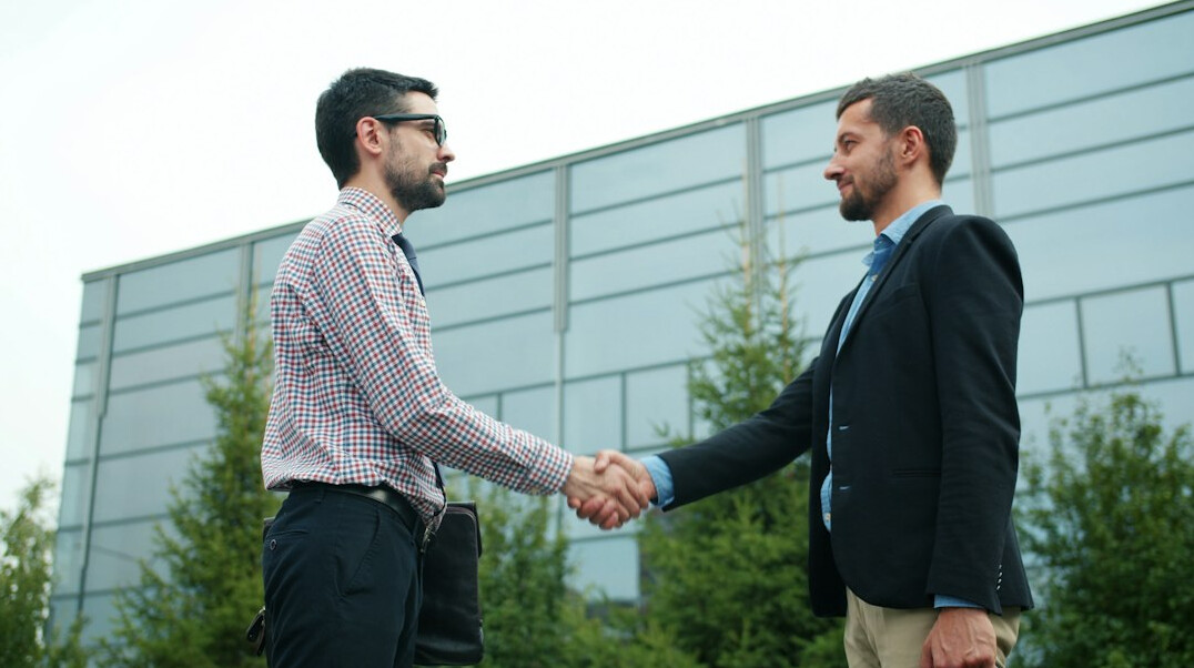 business people shaking hands